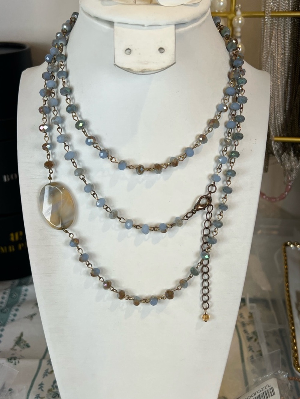 Delicate Multi-Strand Blue Bead Necklace with Faceted Pendant